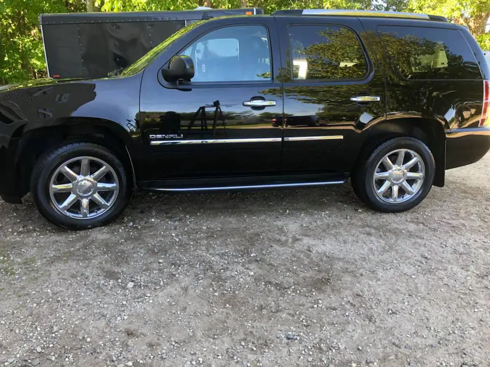 Black Yukon Denali that just had professional detailing services at Reflections Auto in Auburn Maine