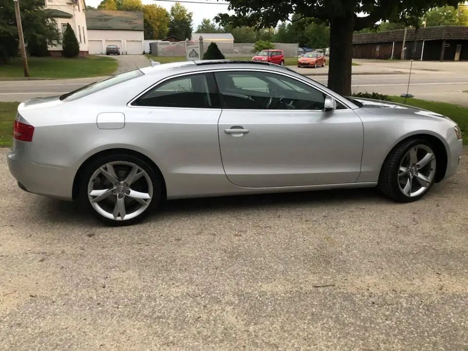 Silver sports car that just had professional detailing services at Reflections Auto in Auburn Maine