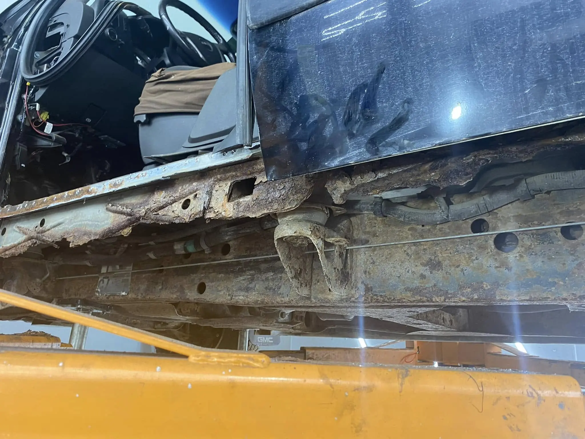 Before picture of Rocker Panel Rust Repair services at Reflections Auto Care in Auburn Maine